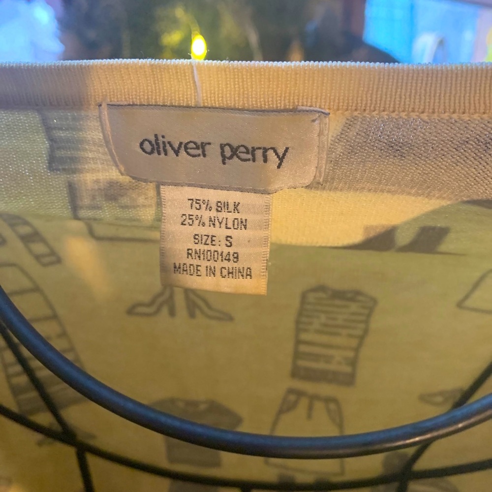 Oliver Perry cardigan fun design and 75%silk.